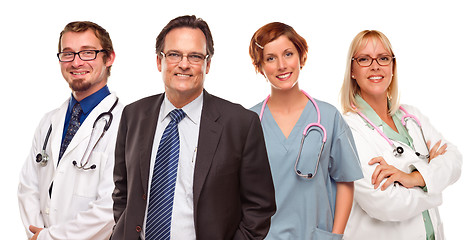 Image showing Smiling Businessman with Doctors and Nurses