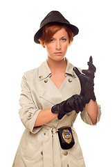 Image showing Female Detective With Badge and Gloves In Trench Coat on White