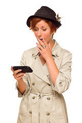 Image showing Smiling Young Woman Holding Smart Cell Phone on White