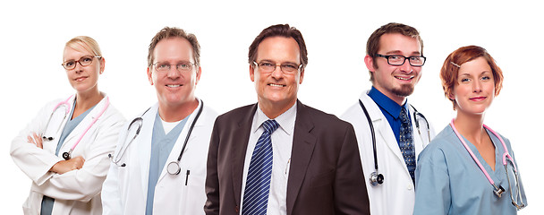 Image showing Smiling Businessman with Doctors and Nurses