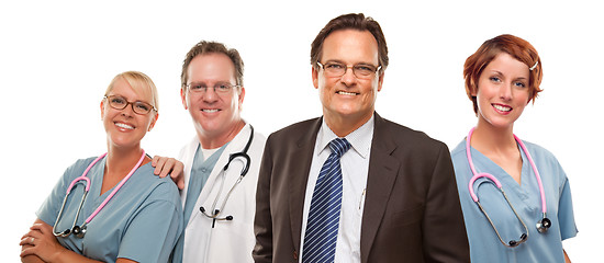 Image showing Smiling Businessman with Doctors and Nurses