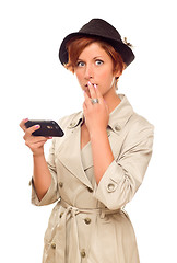 Image showing Shocked Young Woman Holding Smart Cell Phone on White