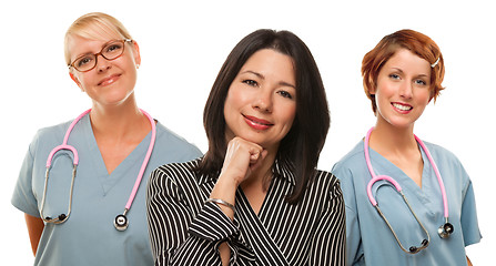 Image showing Hispanic Woman with Female Doctors and Nurses