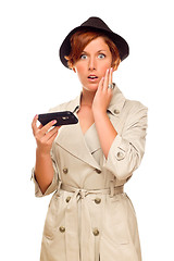 Image showing Shocked Young Woman Holding Smart Cell Phone on White