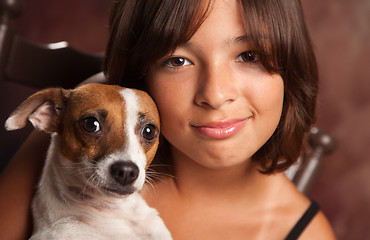 Image showing Pretty Hispanic Girl and Her Puppy Studio Portrait