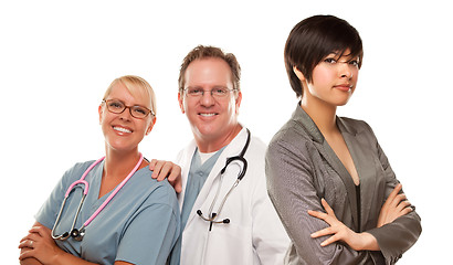 Image showing Young Mixed Race Woman with Doctors and Nurses Behind