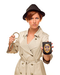 Image showing Female Detective With Handcuffs and Badge In Trench Coat