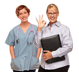 Image showing Businesswoman Making Okay Hand Sign with Doctor or Nurse