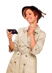 Image showing Smiling Young Woman Holding Smart Cell Phone on White