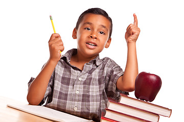 Image showing Hispanic Boy Raising His Hand, Books, Apple, Pencil and Paper