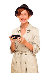 Image showing Smiling Young Woman Holding Smart Cell Phone on White