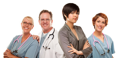 Image showing Young Mixed Race Woman with Doctors and Nurses Behind