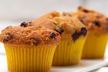 Image showing fresh chocolate and raisins muffins