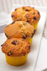 Image showing fresh chocolate and raisins muffins