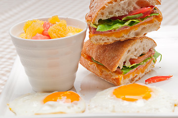 Image showing ciabatta panini sandwich eggs tomato lettuce