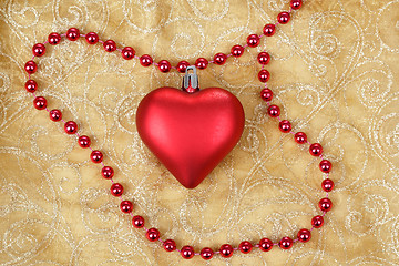 Image showing red heart on christmas tablecloth