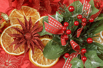 Image showing christmas background with needles. orange slices and gingerbreads