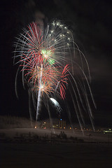 Image showing Multicolored multiple fireworks fireballs in the sky