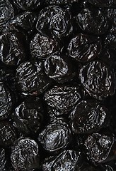 Image showing Dry plums or prunes fruit as background