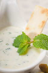 Image showing Greek Tzatziki yogurt dip and pita bread