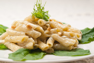 Image showing Italian pasta penne gorgonzola and pine nuts