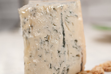 Image showing gorgonzola cheese fresh cut and pinenuts