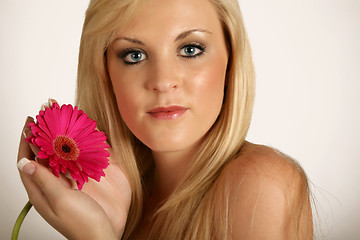 Image showing Beautifull woman with red flower