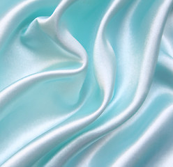 Image showing Smooth elegant blue silk as background