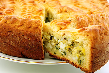 Image showing Cake with eggs and greens.