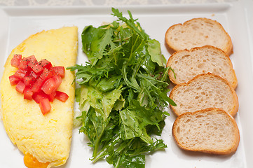 Image showing cheese ometette with tomato and salad