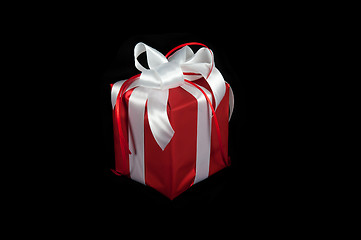 Image showing red gift box on black