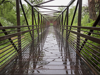 Image showing wet bike trail bridge