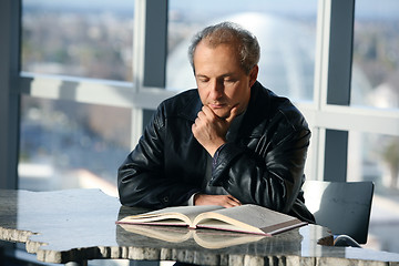 Image showing Man reading a book