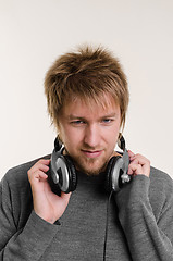 Image showing Young man with headphones