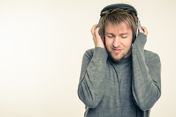 Image showing Young man with headphones