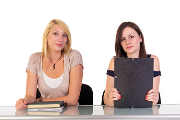 Image showing Two beautiful student girls getting ready for school