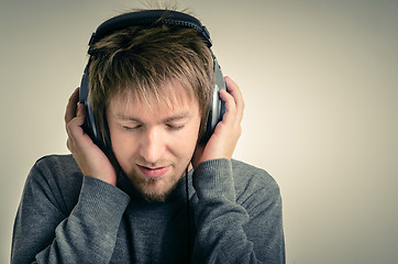 Image showing Young man with headphones