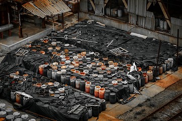 Image showing Chemical waste dump with a lot of barrels