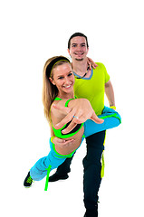 Image showing Acrobatic dancing with two young trainers