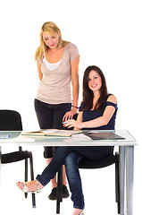 Image showing Two beautiful student girls getting ready for school