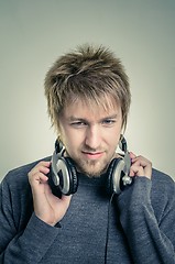 Image showing Young man with headphones