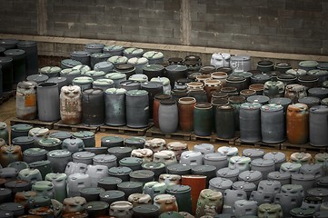 Image showing Chemical waste dump with a lot of barrels