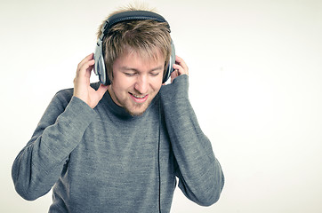 Image showing Young man with headphones