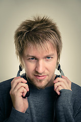 Image showing Young man with headphones