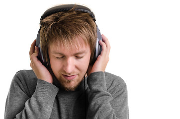 Image showing Young man with headphones