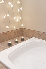 Image showing Bathroom decorated with cozy lights and candles