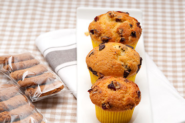 Image showing fresh chocolate and raisins muffins