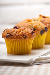 Image showing fresh chocolate and raisins muffins