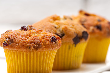 Image showing fresh chocolate and raisins muffins