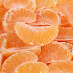 Image showing Tangerines sliced in pieces